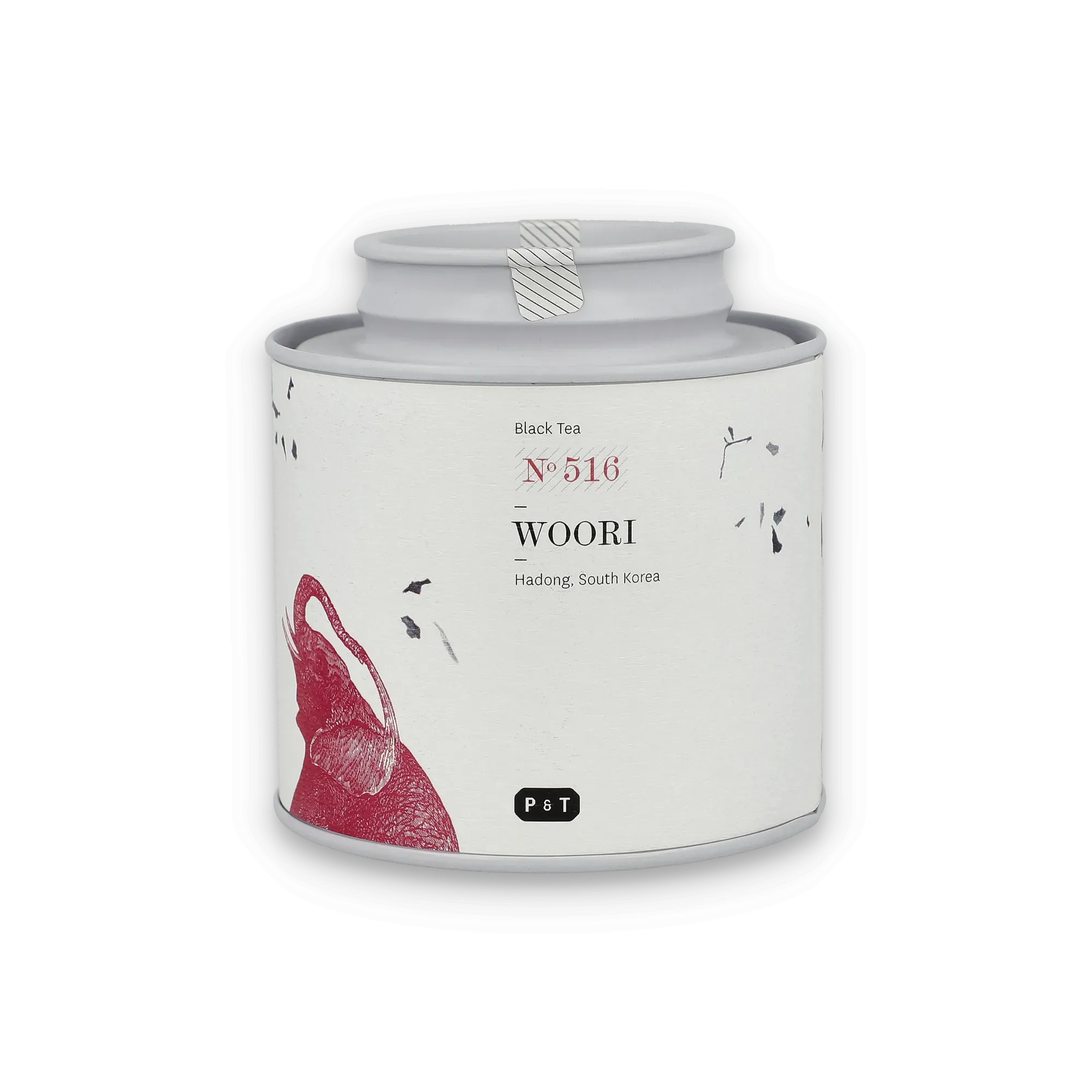 Weißer Zylinderbehälter mit minimalistischem Etikett für WOORI No 516 Schwarztee aus Hadong, Südkorea, mit rotem Vogelmotiv.
